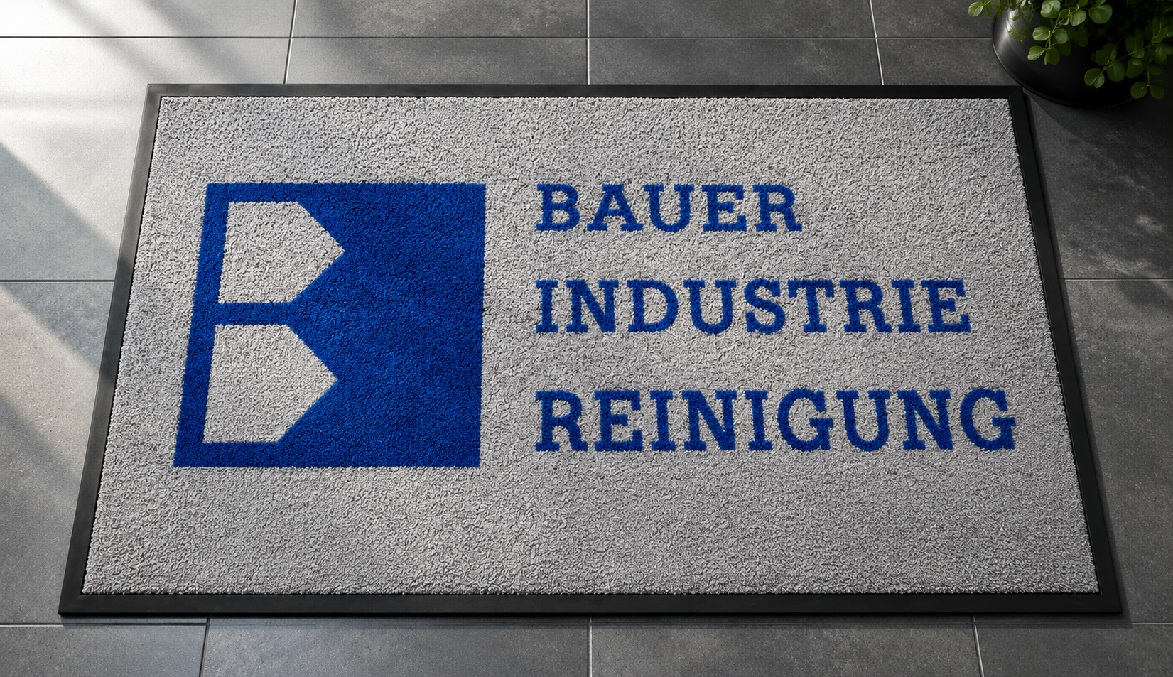 Bauer Industriereinigung – individuelle Schmutzfangmatte mit Logo